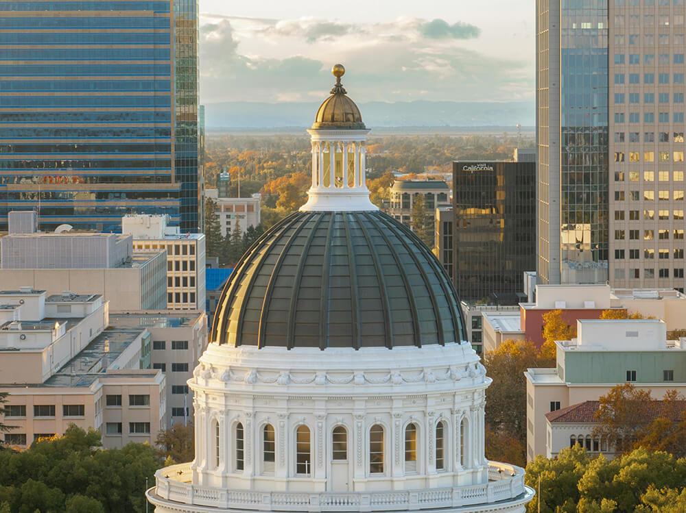 California Capitol building dome with city in the background